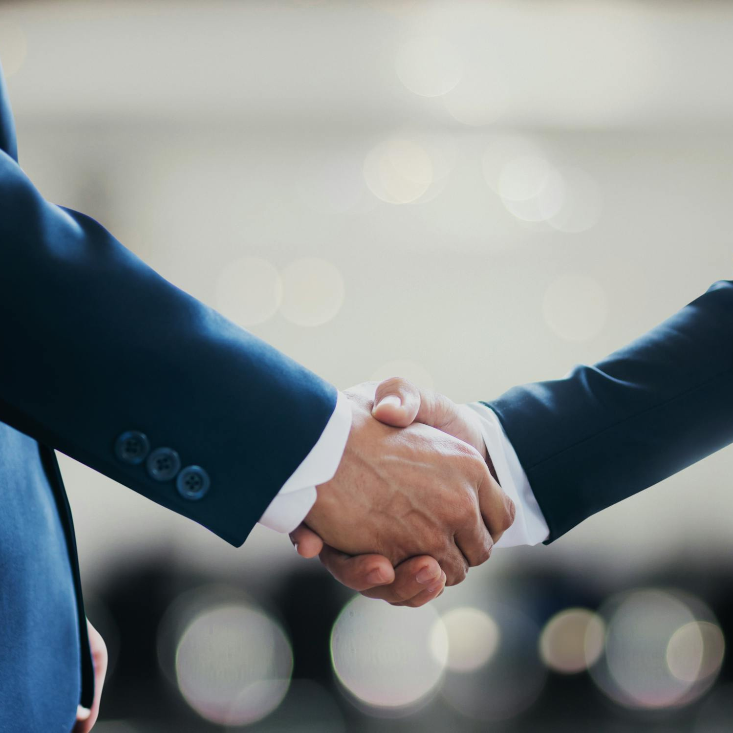 Men-handshaking-for-made-a-succesful-business-deal